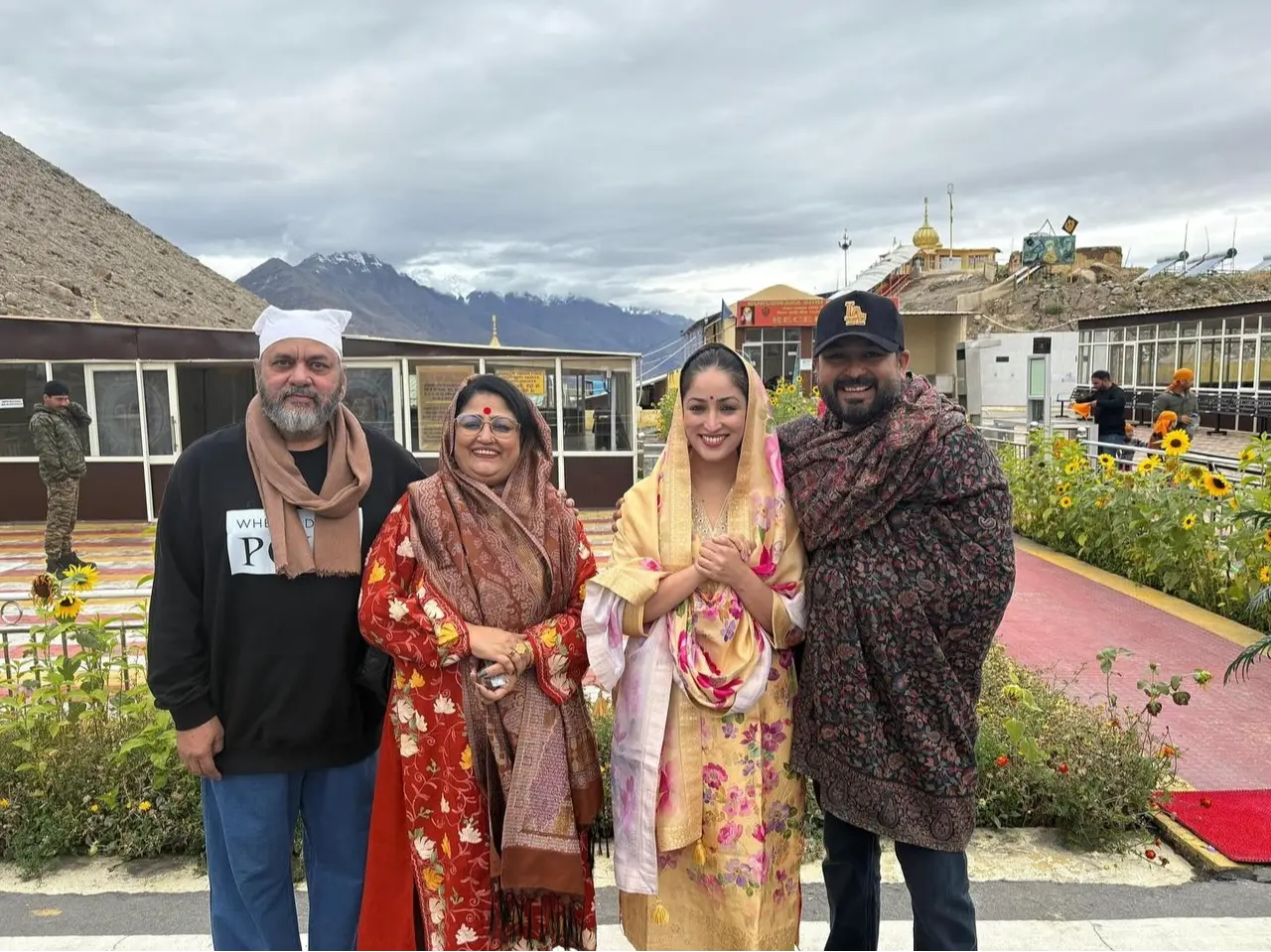 Aditya and Yami are joined by his parents as they offer prayers at a temple in Leh.